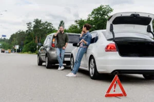 Drivers Talking By Smartphones On Boad After Car Image